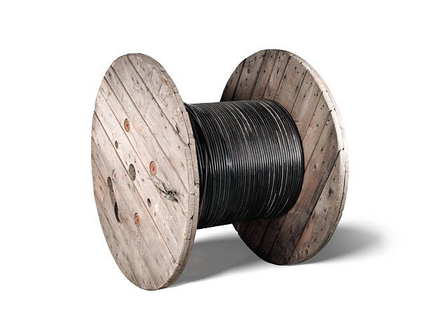 istock Isolated fiber optic wooden cable reel. 2215905092