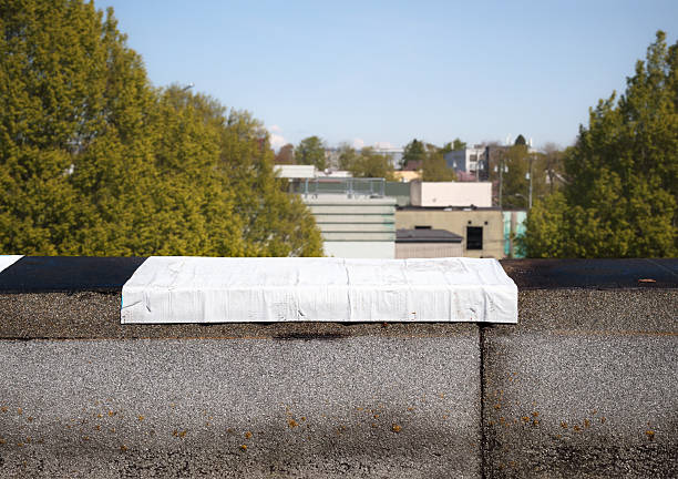 istock Self-adhered waterproof membrane on flat roof edge. 2215905217