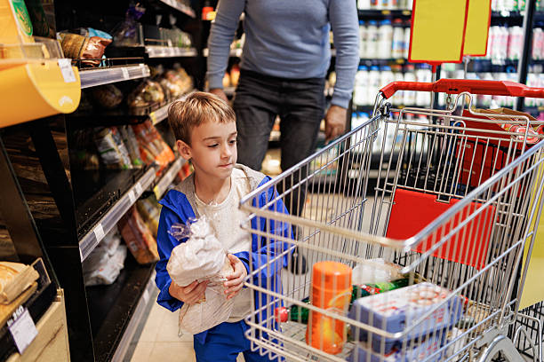 istock Parent and Child at Bakery Display 2215910047