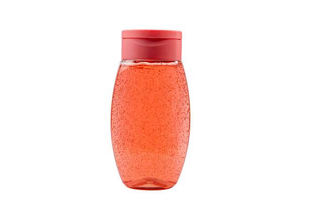 Shower gel or shampoo red on white background.