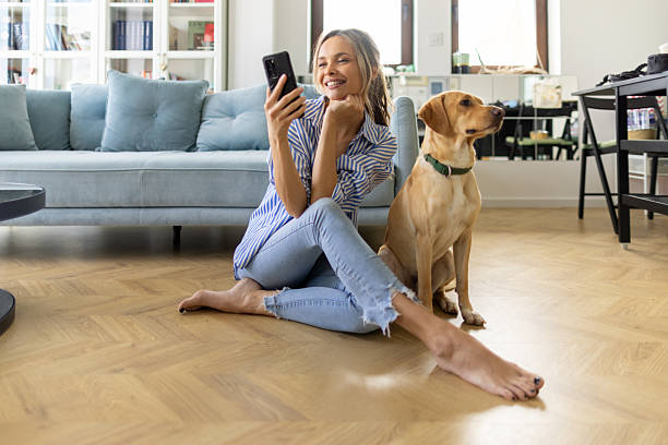 istock Beautiful young woman and her dog 2215918247