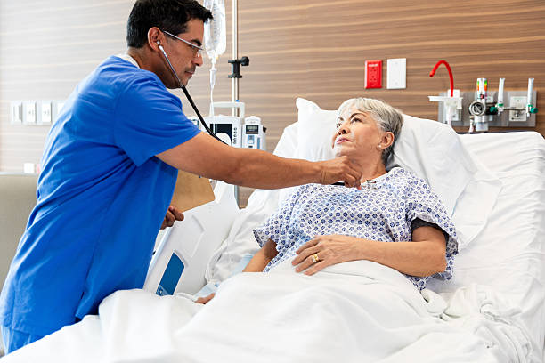 istock Doctor using stethoscope examining patient in hospital 2215918541