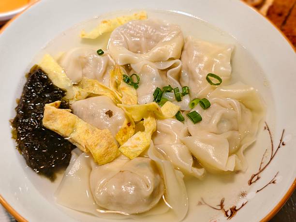 istock Traditional Chinese Pork Dumpling Soup with Egg and Seaweed 2215919702