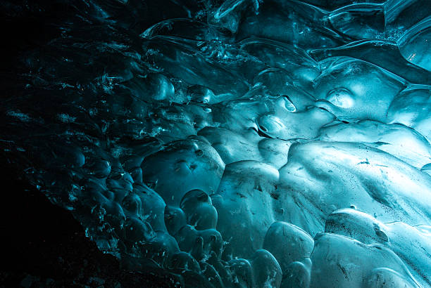 istock Stunning Blue Ice Cave in Icelandic Glacier with Natural Crystal Formations 2215926165