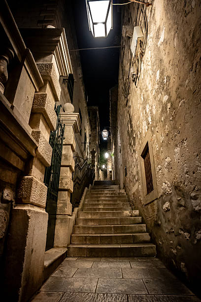 View down ancient narrow streets of Dubrovnik at night