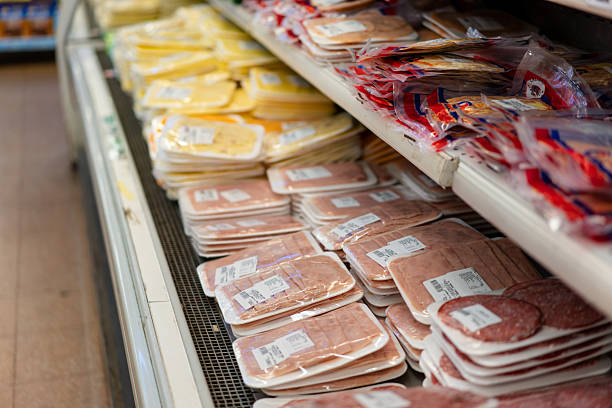 istock Assorted food products organized on racks in grocery store 2215927769