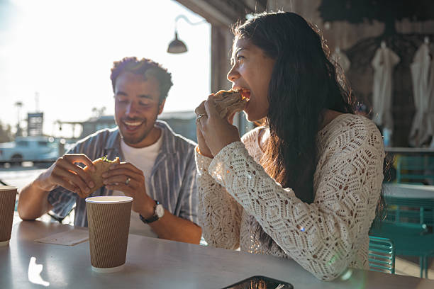 istock Couple having a lunch break outdoors 2215928204