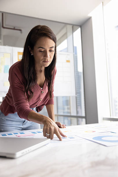 istock Confident young woman executive develop startup at corporate office 2215931061
