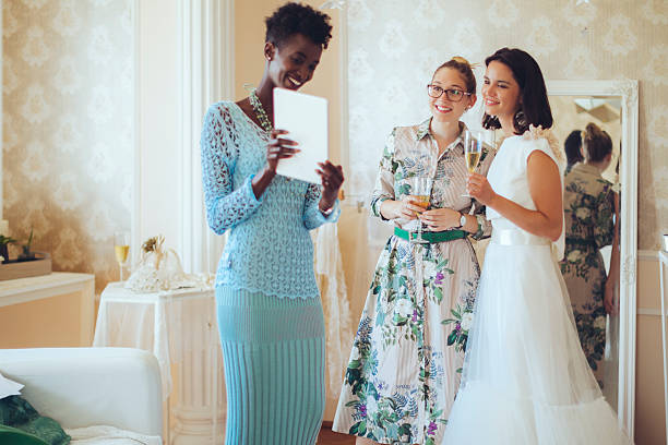 istock The bride is trying on her wedding dress 2215931447