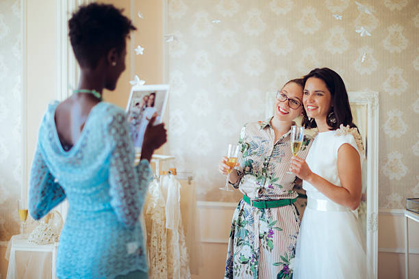 istock The bride is trying on her wedding dress 2215931484