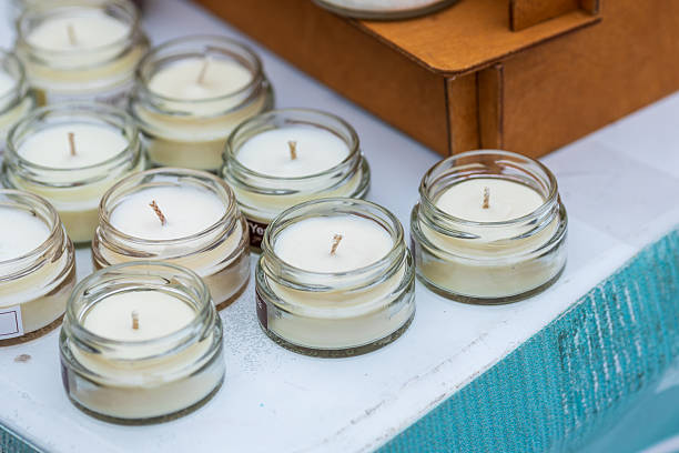 istock A row of small glass jars with candles in them 2215932364
