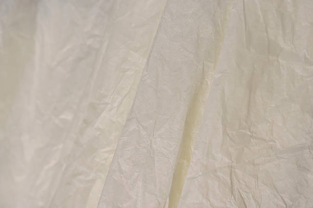 istock crumpled light-colored wrapping paper after prolonged use 2215934205