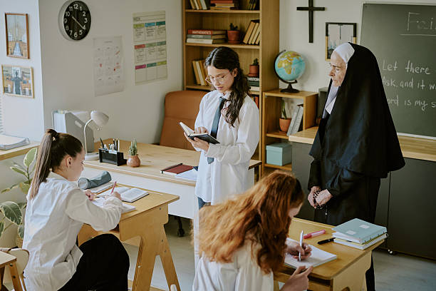 Engaging in Classroom Activities at School with Nun Present