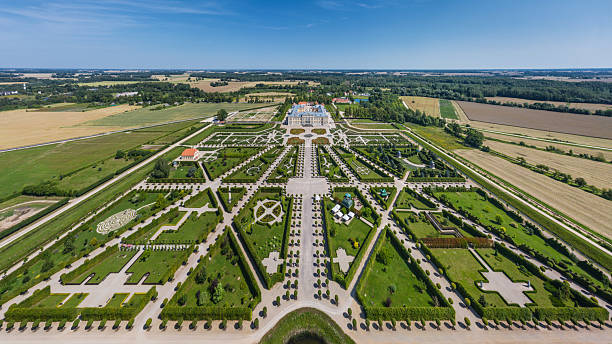 Paris, France - May 2019: Latona fountain and Versailles park landscape at sunset