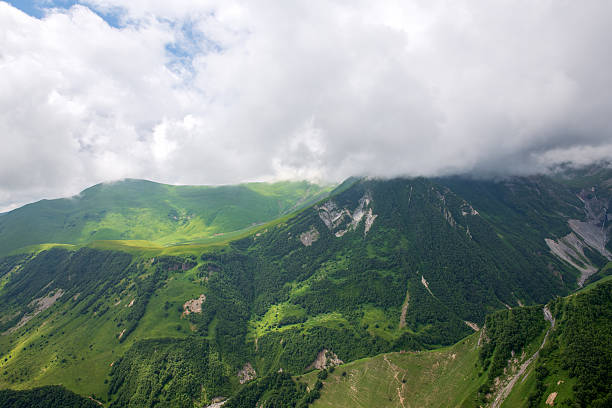 Summer Caucasus  Mountain Scenery in Gudauri city Under Cloudy Skies, Georgia country. Georgian military road.