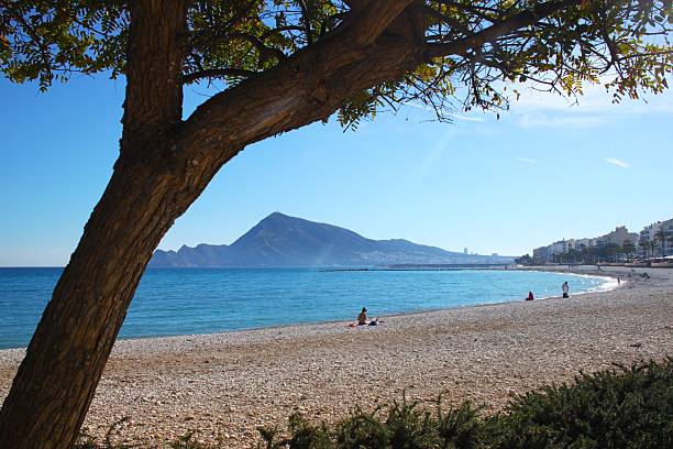istock Serene beach scene with mountain view in Altea, Spain. 2215942405