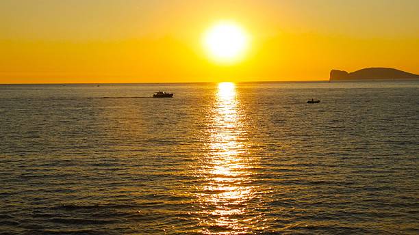 istock Sunset Over Ocean with Boats 2215942426