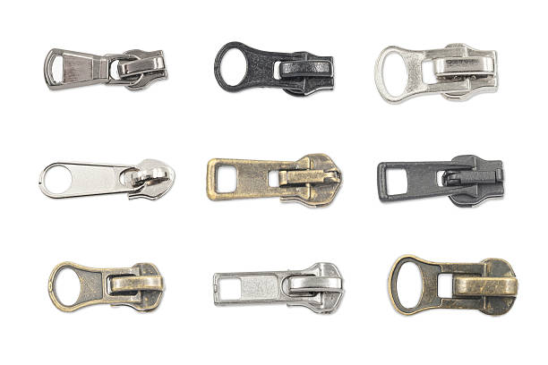 Replacement parts for clothing or accessories. Set of sewing fasteners. Industrial garment elements.