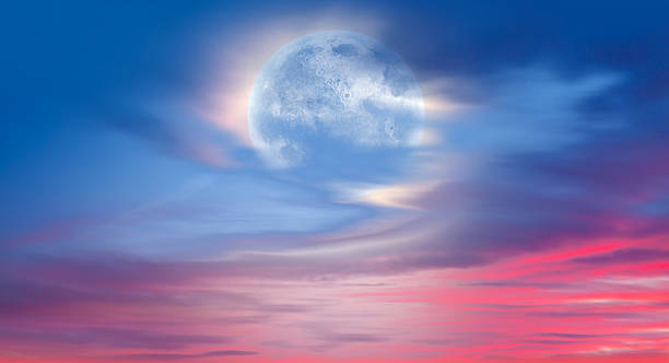 istock Full moon over the sea at sunset 2215944414