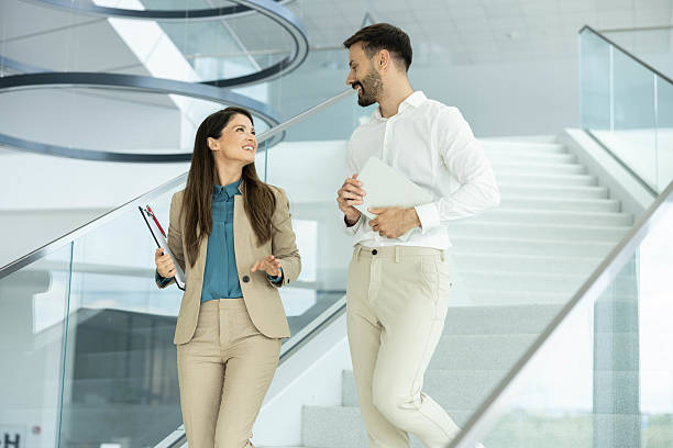 istock Joyful Business Professionals Communicating 2215944627