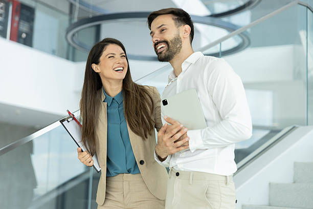 istock Happy Teammates in Dynamic Office Space 2215944636