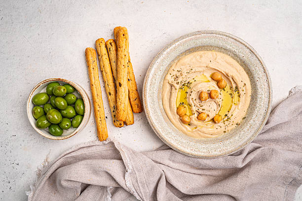 istock Various hummus dips, healthy and vegan snack 2215945380