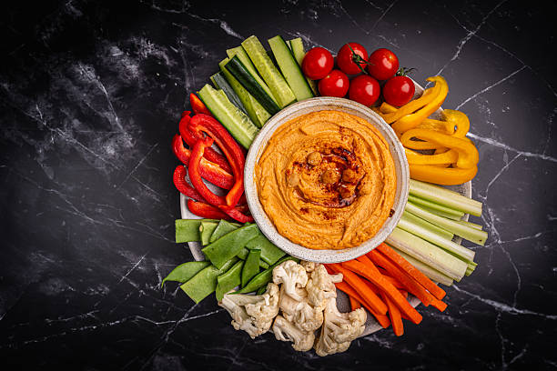 istock Various hummus dips, healthy and vegan snack 2215945413