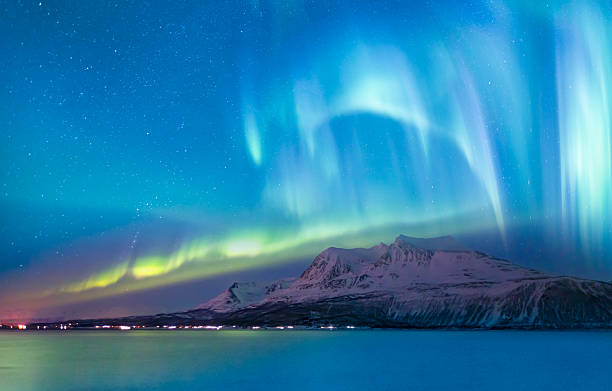 istock Northern lights or Aurora borealis in the sky - Tromso, Norway 2215948210