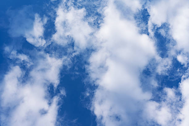 istock Bottom view of the blue summer sky with white clouds, copy space 2215951036