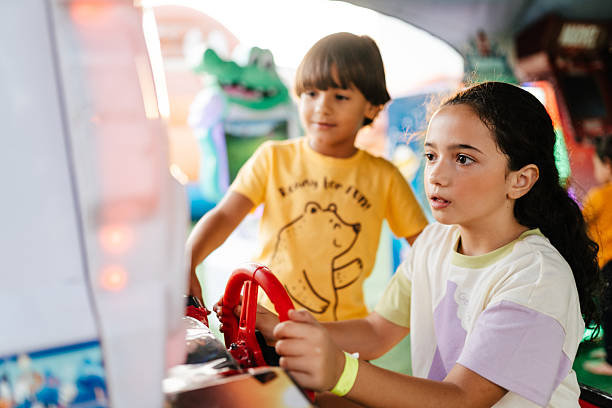 istock Children having fun at game booth 2215951716