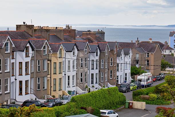 istock A row of charming, multi-colored houses 2215952245