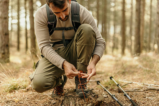 istock Man preparing for a forest hike adventure 2215955782