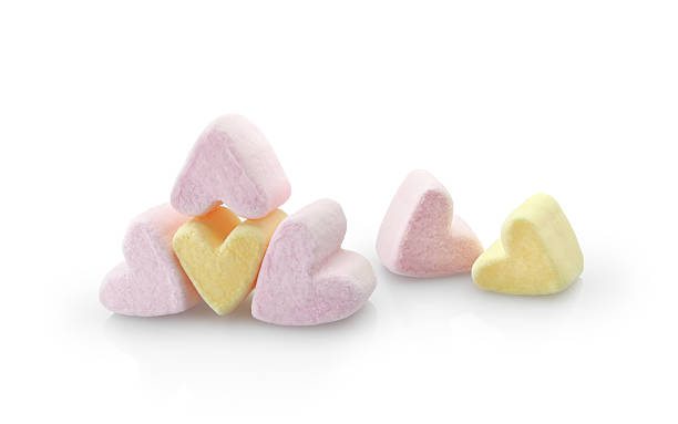 istock Heart shaped marshmallow isolated on white 2215957901