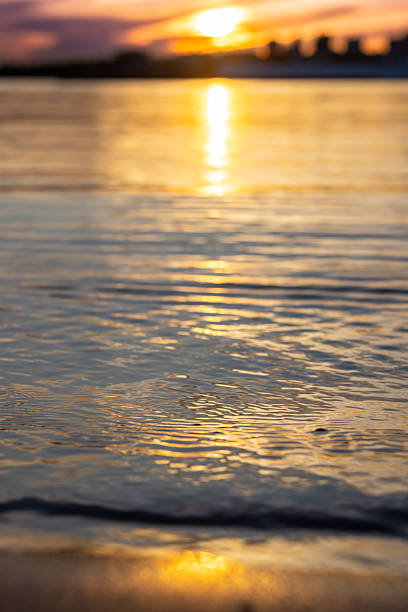 istock Sunset on horizon over land with seascape. 2215961835