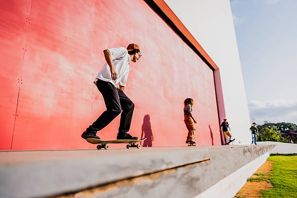 istock Young man riding a skateboard outdoors 2215962241