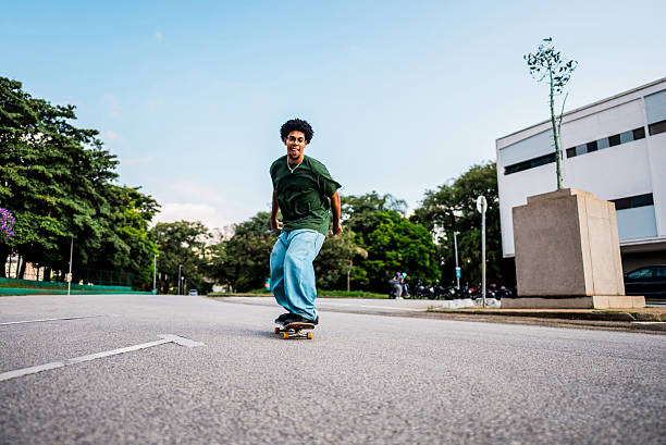 Young man riding a skateboard outdoors