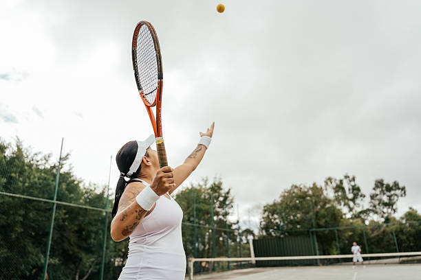 istock Latina woman playing tennis 2215962633