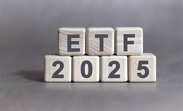 istock ETF 2025 on wooden cubes text on a background 2215982420
