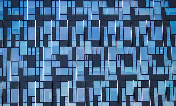istock Modern Office Building Facade with Geometric Windows in London 2215983442