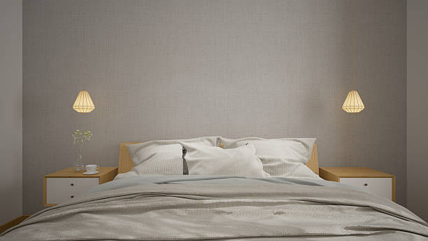 istock White modern hotel bedroom interior with bed night table lamp background.3D rendering 2215983710