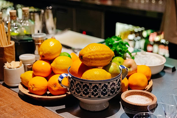 istock Citrus Fruit Display on Bar Counter at Night. 2215984603
