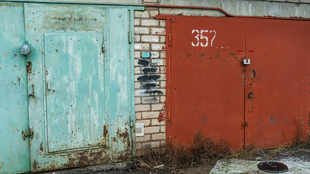istock An old garage cooperative featuring vintage garages and weathered doors, showcasing a nostalgic atmosphere and the charm of bygone craftsmanship in a rustic setting. 2215989624