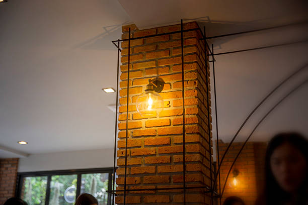 Brick wall hanging lamp in restaurant Illuminate with warm light