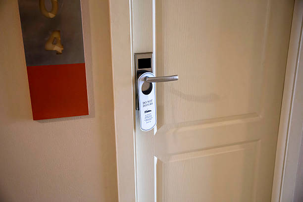 istock Do not disturb sign hanging on the door 2215996005