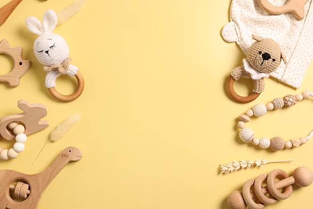 istock Different baby accessories on yellow background, flat lay. Space for text 2215996379