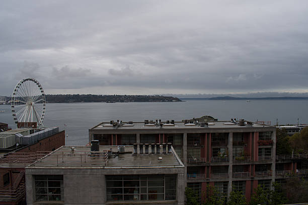 The Seattle Great Wheel is seen on Elliott Bay in Seattle, Washington, USA, on April 7, 2025. The waterfront Ferris wheel opened to the public in 2012 and has become a prominent city landmark.