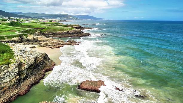 istock Experience the Stunning Coastal Views featuring Waves and Unique Rock Formations in Nature 2215999246