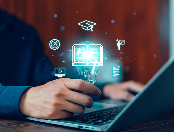istock Man holding light bulb on virtual screen. Online education concept. Choose the correct answer. Online digital technology concept. Internet learning training course. Digital. 2216000942