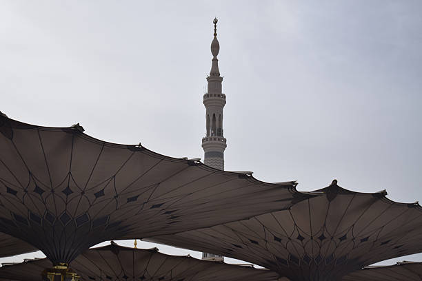 istock Nabawi Mosque with open umbrellas and minarets 2216004507
