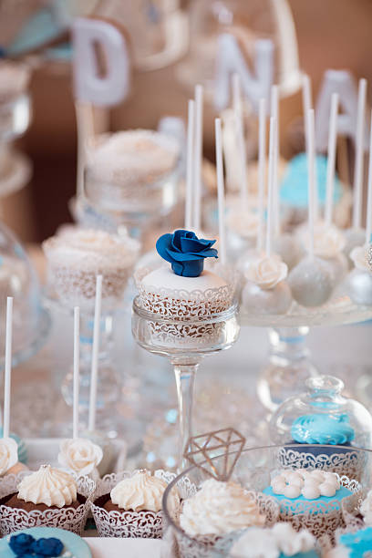 istock Elegant Dessert Table With Blue And White Cupcakes And Cake Pops 2216006199